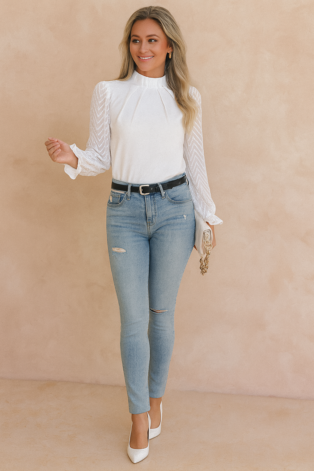 Chic women's blouse with sheer chevron long sleeves & high neck. Perfect for work or an elegant evening out.