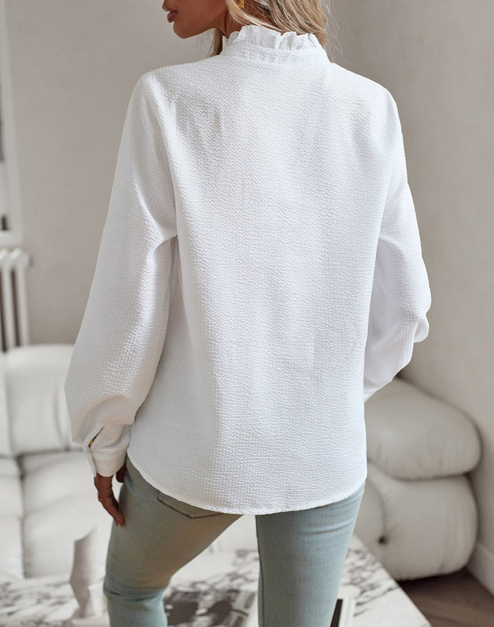 Soft, comfortable women's elegant blouse. Timeless style top with a relaxed fit, perfect for all-day wear.