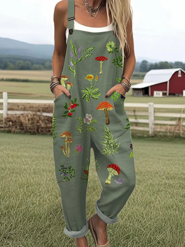 Women's elegant dark green embroidered jumpsuit with nature-inspired floral & botanical patterns, perfect for summer casual fashion.