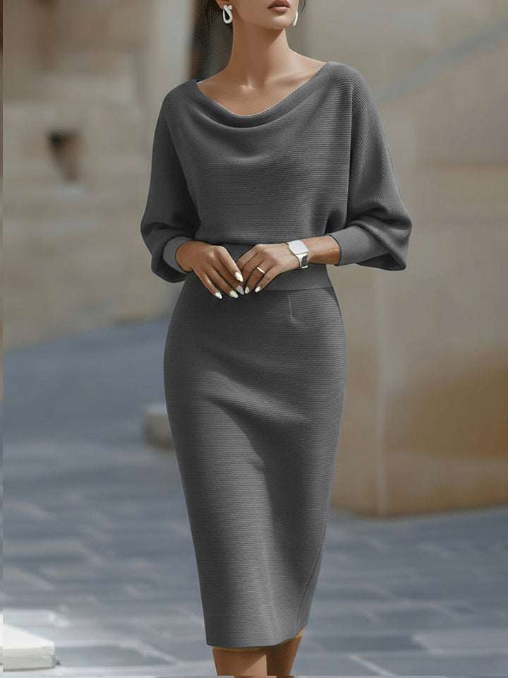 Elegant women's batwing sleeve midi dress, a draped cocktail & work dress. Perfect for sophisticated occasions.
