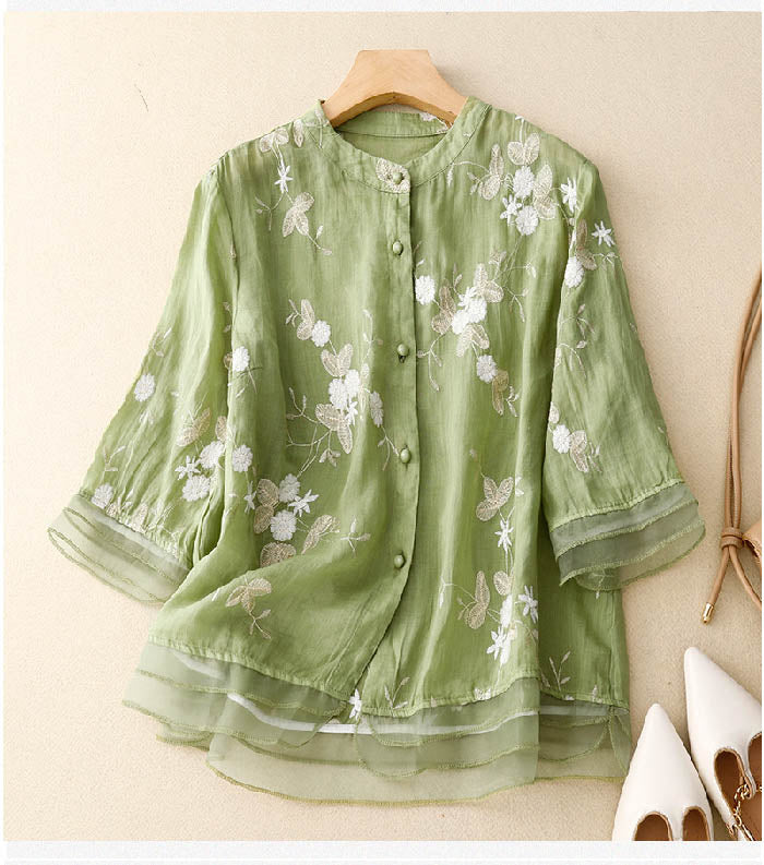 Women's elegant embroidered blouse with long sleeves, featuring a flattering fit, perfect for chic daily outfits.