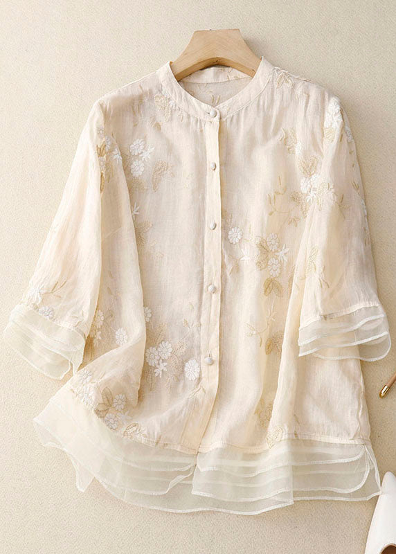 Chic women's fashion blouse with intricate embroidery, offering a versatile and elegant style for any occasion.