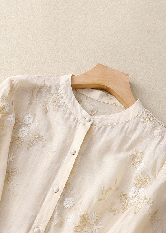 Long sleeve embroidered top for women, an elegant fashion blouse with a flattering silhouette and intricate details.