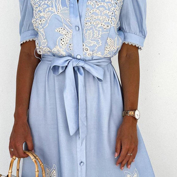 White embroidered maxi dress, a stylish and flowy long dress for women, perfect for summer beach vacations.