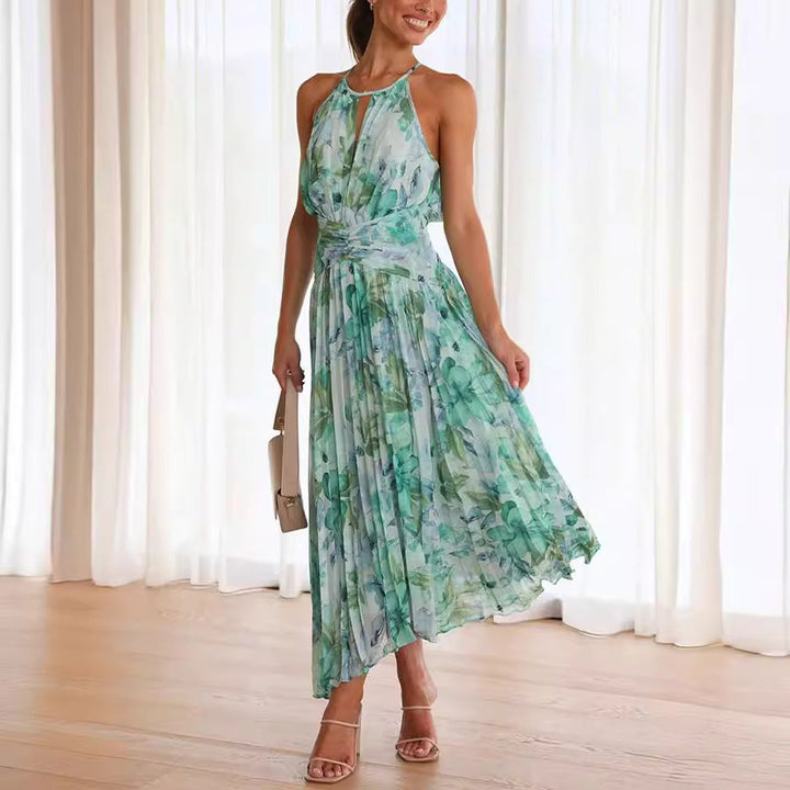 Effortless women's floral midi dress with a stylish halter neck, ideal for wedding guests & parties.