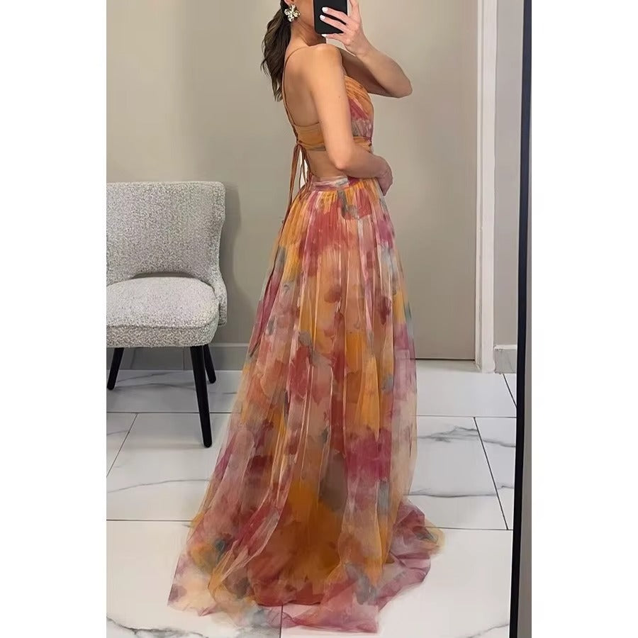 Flowy floral maxi dress, women's sleeveless evening gown. Perfect for a romantic summer party or wedding guest.