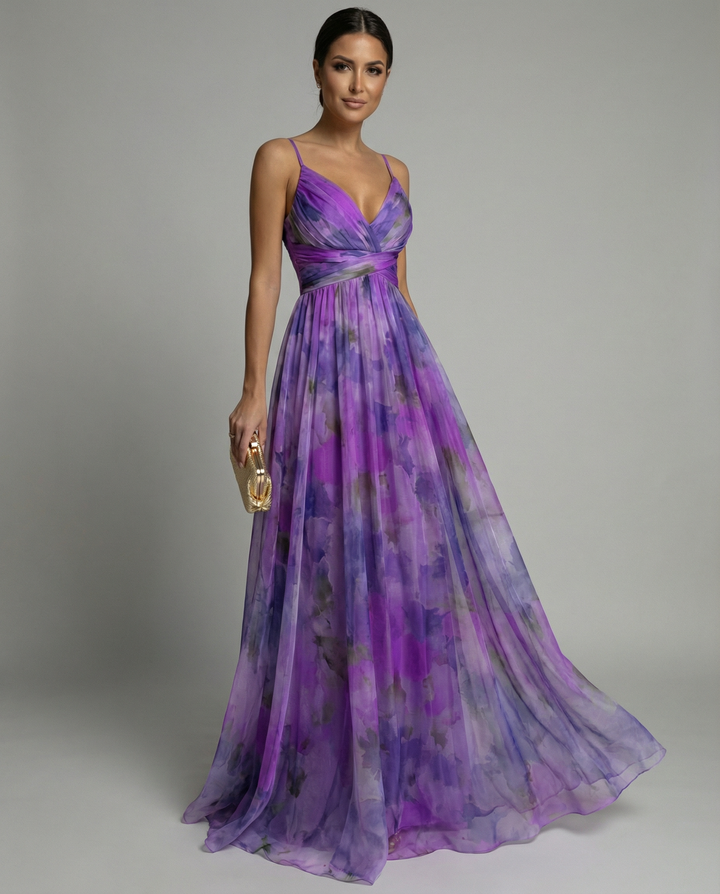 Stunning floral evening gown for women, a sleeveless maxi dress with a romantic floor-length design. Occasion wear.