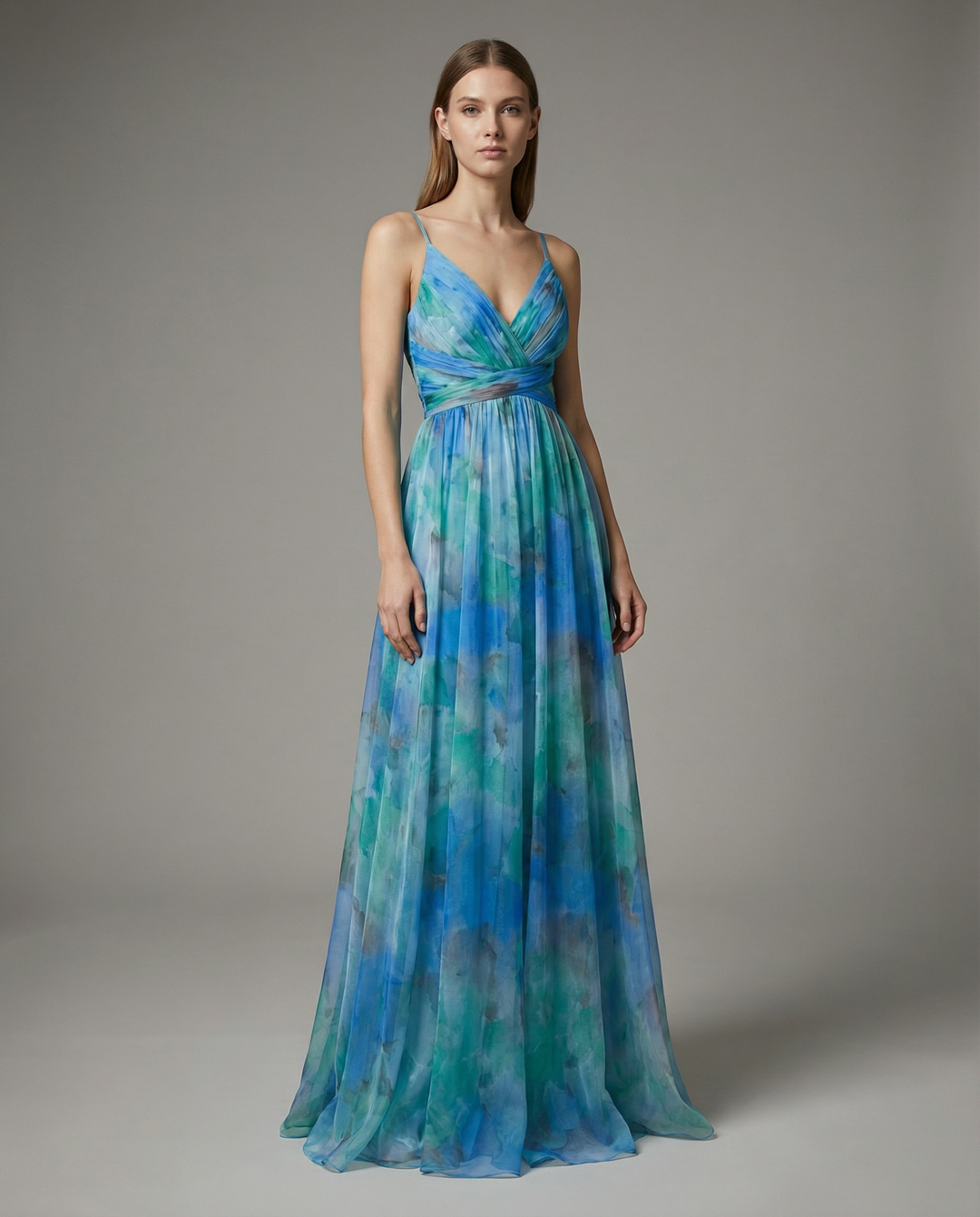 Vibrant floral summer maxi dress, women's elegant sleeveless party dress. Ideal wedding guest or occasion wear.