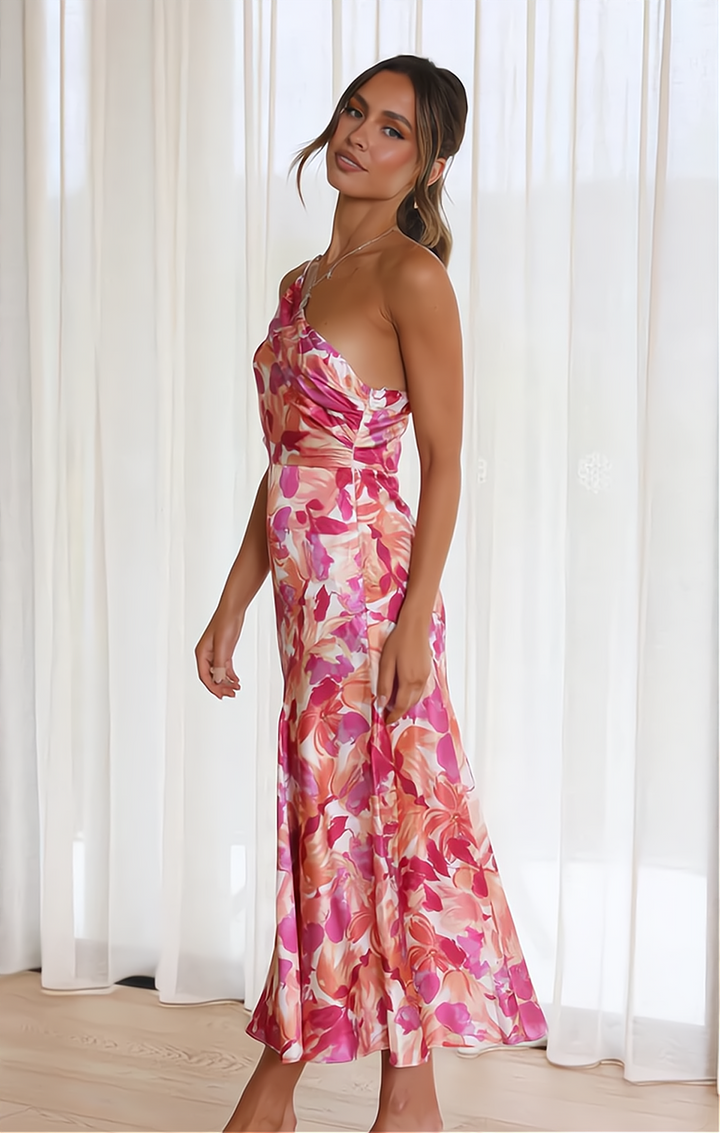 Model wearing a women's elegant floral off-shoulder summer dress, ideal for a party or a stylish casual outing.