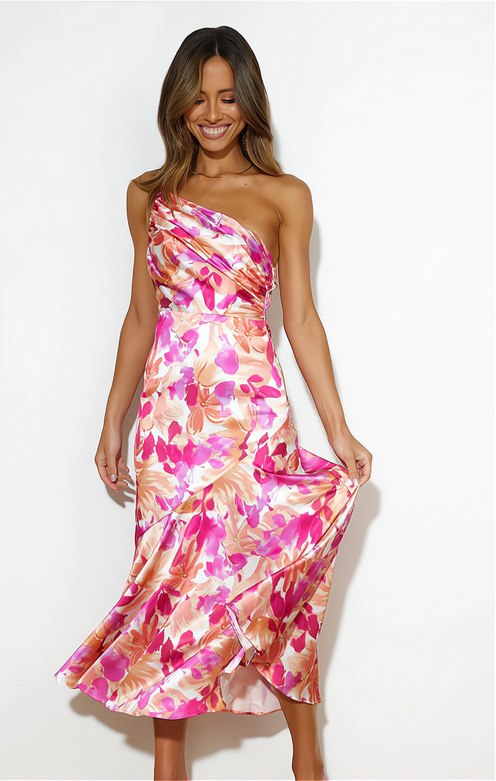 Flowy women's floral summer dress with an elegant off-shoulder cut and delicate spaghetti straps for comfort.