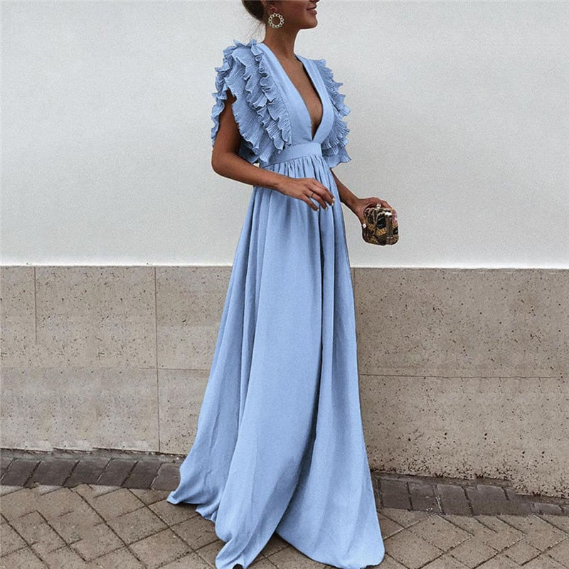 Graceful women's flowy maxi dress, offering elegant style & ultimate comfort for all occasions.