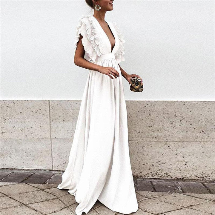 Elegant women's long maxi dress with a flowy design, ensuring comfort & style for any occasion.