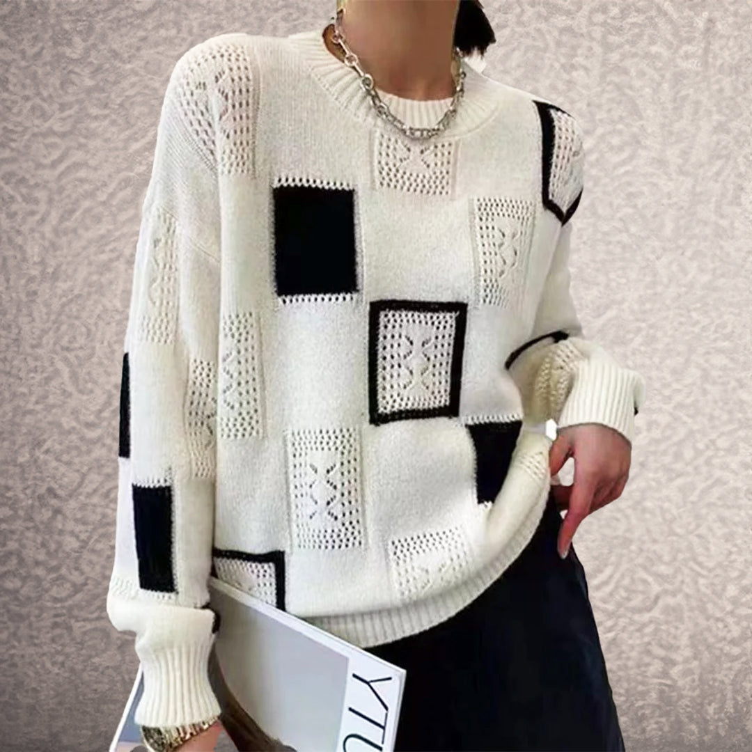 Women's elegant geometric pattern winter jumper, oversized fit, black and white long sleeve sweater for casual chic.
