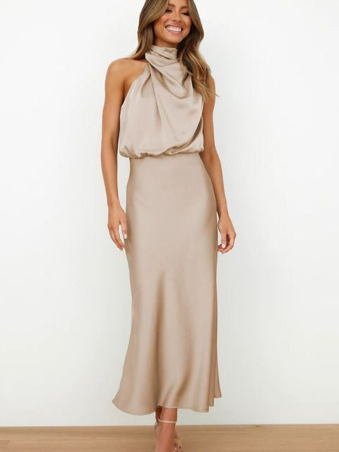 Flattering A-line women's formal midi dress, featuring an elegant halter neck. Perfect as an evening gown.