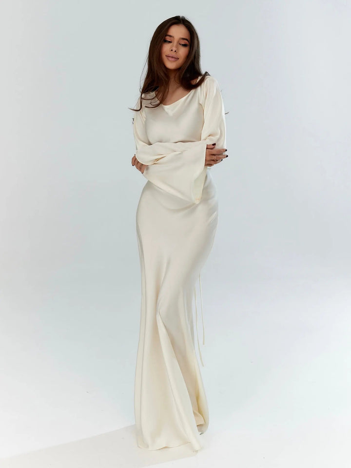 Women's elegant long sleeve flowing maxi dress, a sophisticated choice for formal events & special occasions.