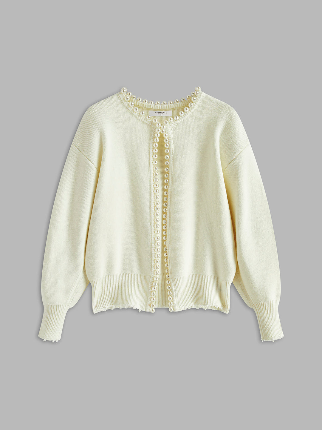 White women's cardigan with exquisite pearl trim. A chic & versatile one-size elegant sweater for any outfit.