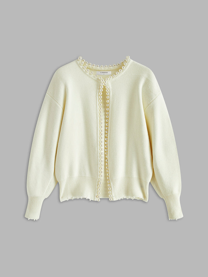 White women's cardigan with exquisite pearl trim. A chic & versatile one-size elegant sweater for any outfit.
