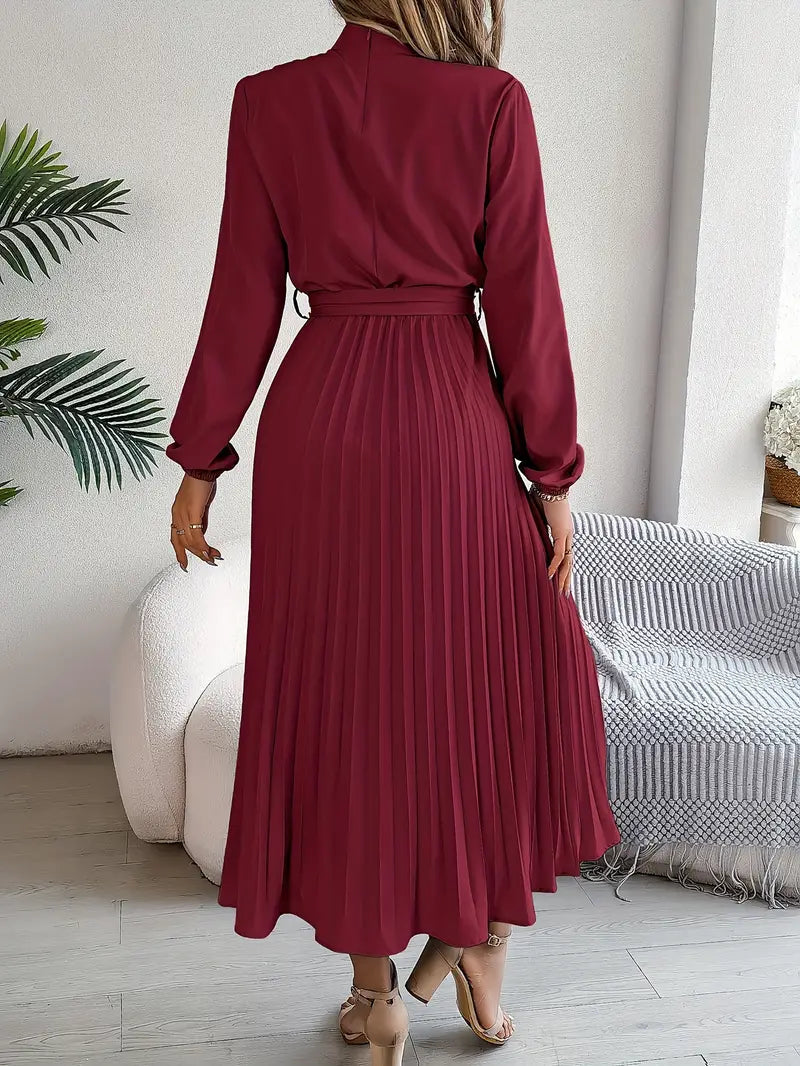 Women's elegant pleated midi dress, perfect as a wedding guest dress, with belt.