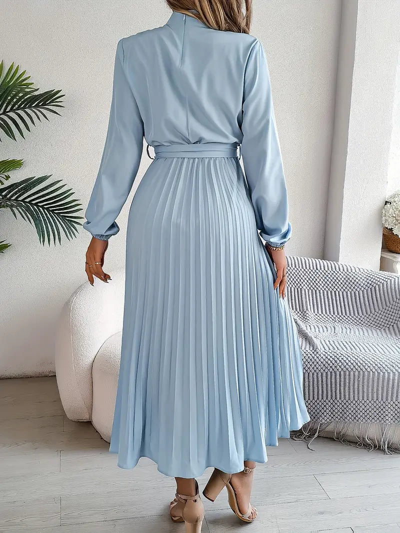 Chic women's belted pleated midi dress, flowy silhouette, great for party or occasion.