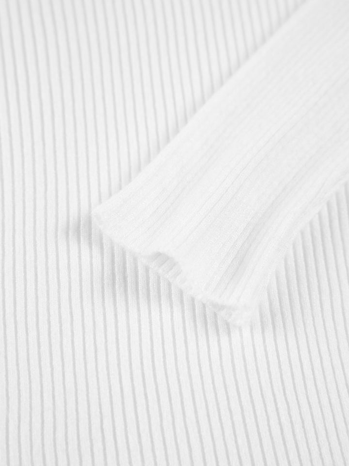 Women's cozy ribbed high neck long sleeve sweater. An elegant and versatile top for fall & winter fashion.