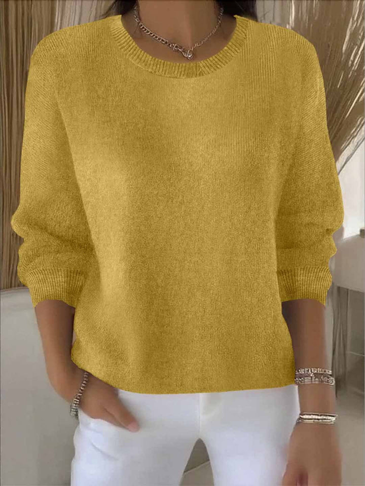 Women's elegant sophisticated knit sweater. Perfect for effortless style & comfort wear. Chic long sleeve top.