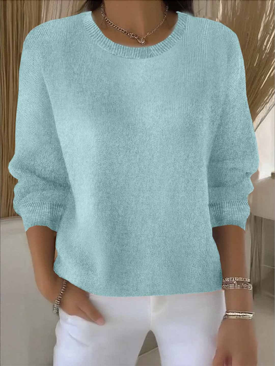 Women's versatile elegant sweater. Sophisticated comfort wear, chic long sleeve knit for effortless style.