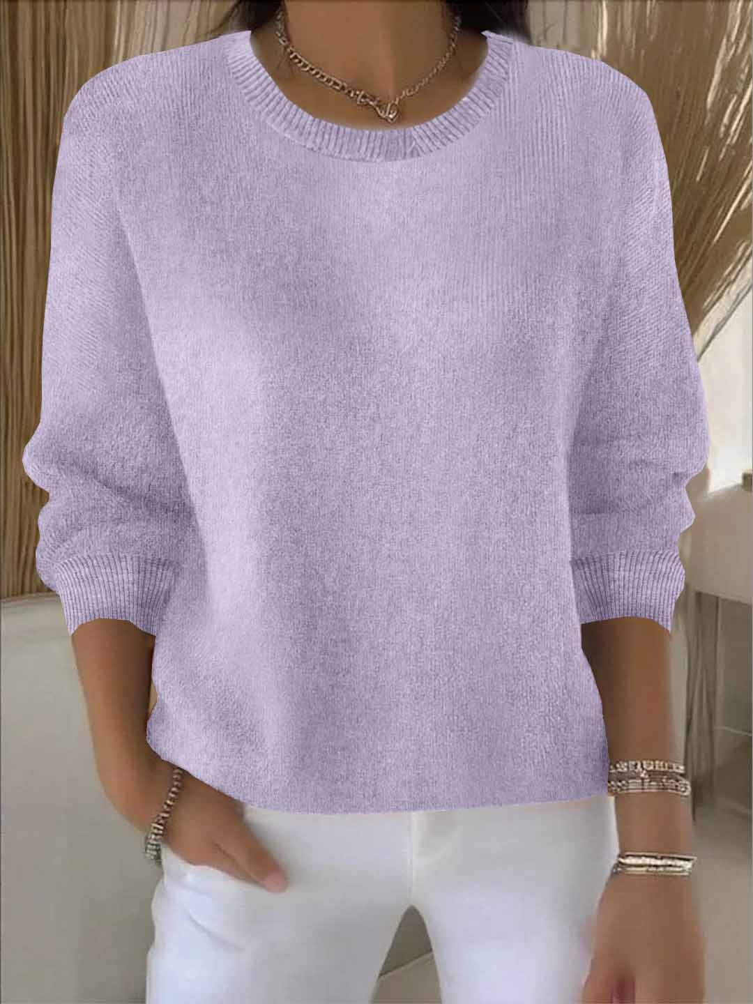 Premium women's elegant sophisticated sweater. Comfortable knitwear for chic, versatile everyday fashion.