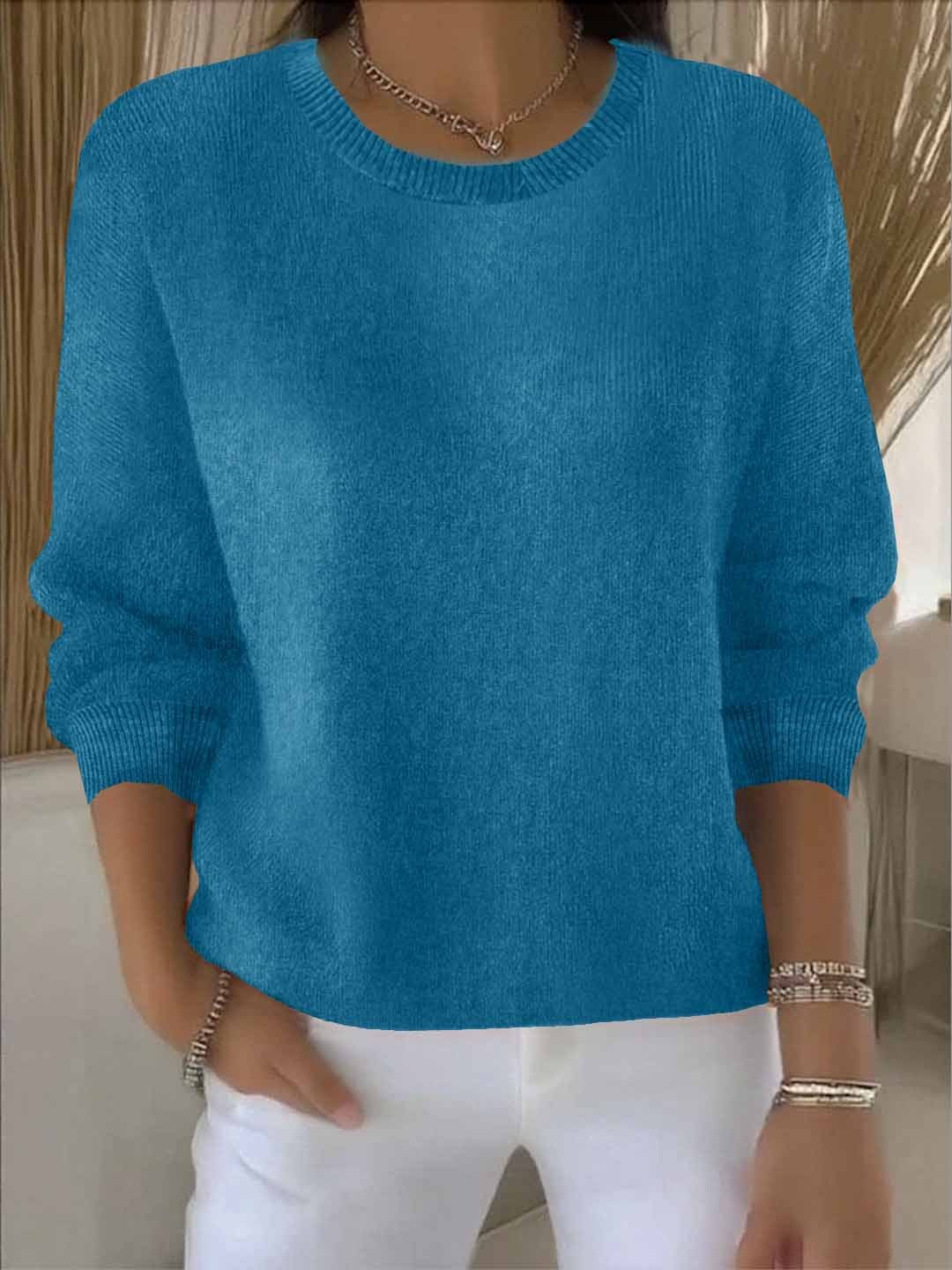 Versatile women's sophisticated sweater. Elegant knitwear, ideal layering piece for everyday chic style.