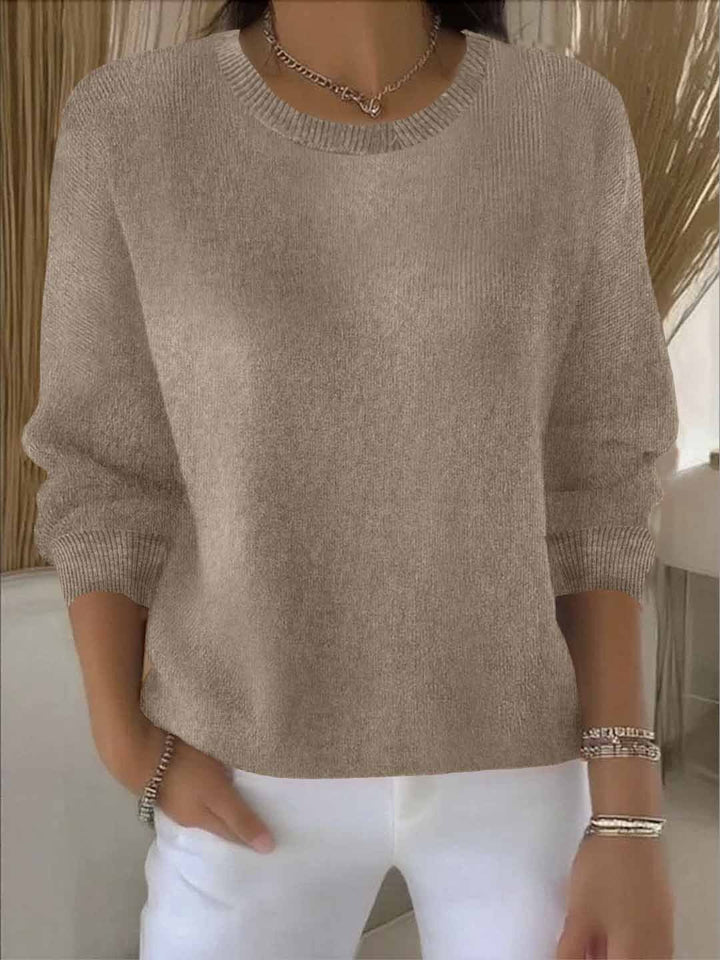 Sophisticated women's sweater. Elegant knit top, comfortable and chic for versatile everyday fashion.