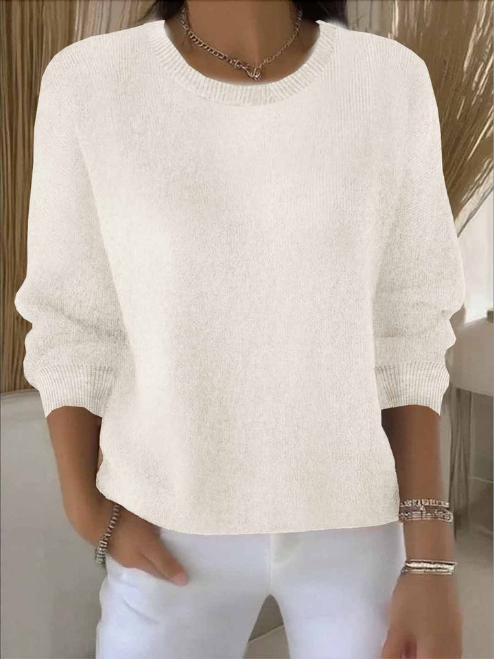 Casual elegant women's sweater. Sophisticated knitwear for comfortable, versatile & chic apparel.
