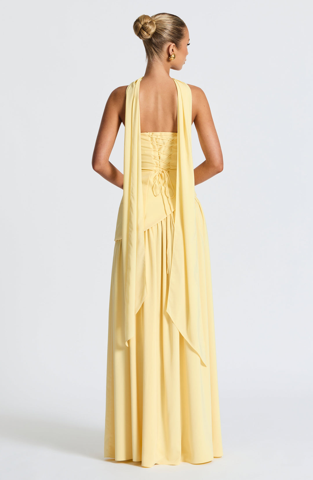 Flowing women's strapless maxi dress featuring a sexy front slit, essential for elegant summer fashion.