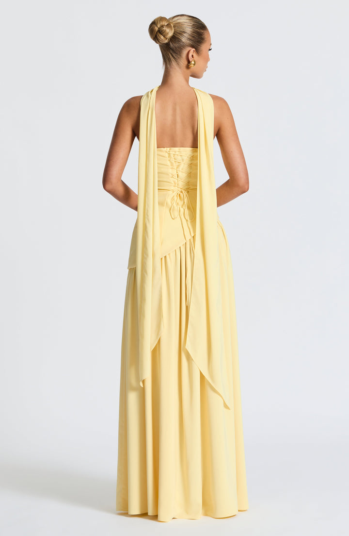 Flowing women's strapless maxi dress featuring a sexy front slit, essential for elegant summer fashion.