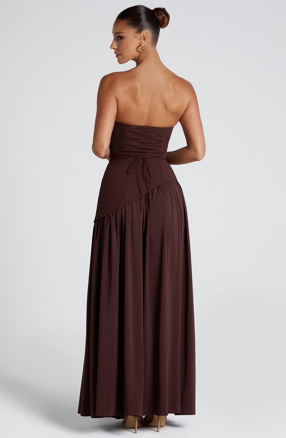 Elegant strapless maxi dress for women, featuring a chic front slit, ideal for summer party fashion.