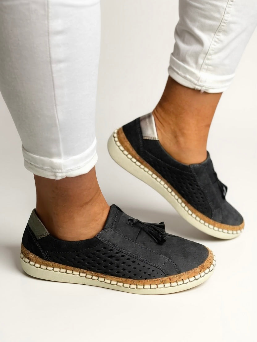Women's elegant tassel slip-on loafers. Versatile comfort footwear for casual or dressy occasions.