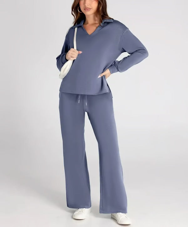 Complete women's two-piece lounge set, featuring a chic collared top and comfortable drawstring pants.