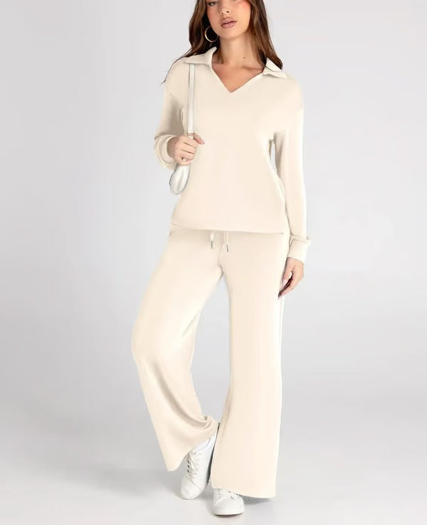 Side profile of women's comfortable two-piece lounge set, featuring a collared top and drawstring pants.