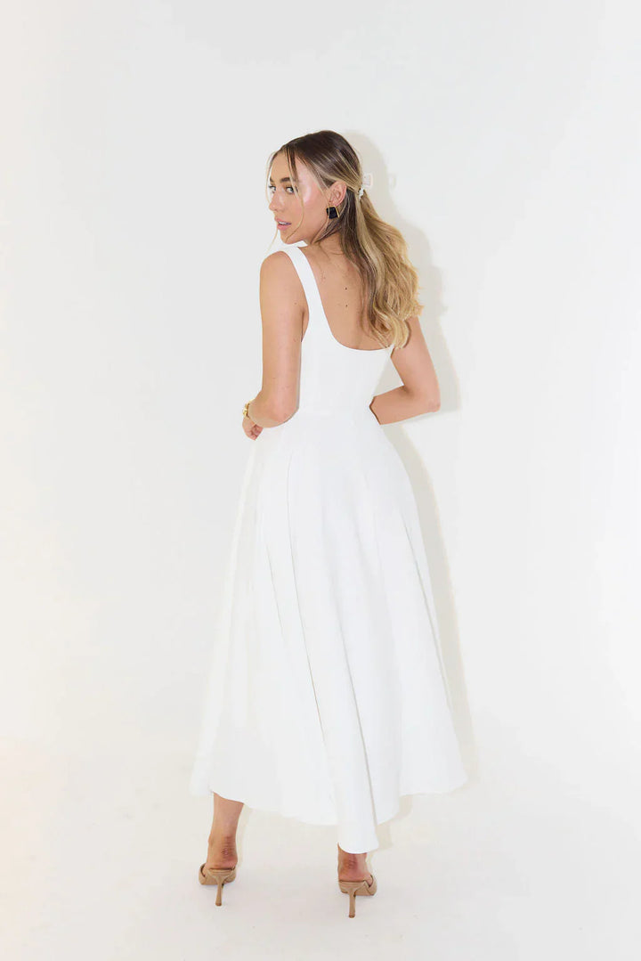 Timeless women's flared midi cocktail dress, ideal for parties and elegant occasion wear.