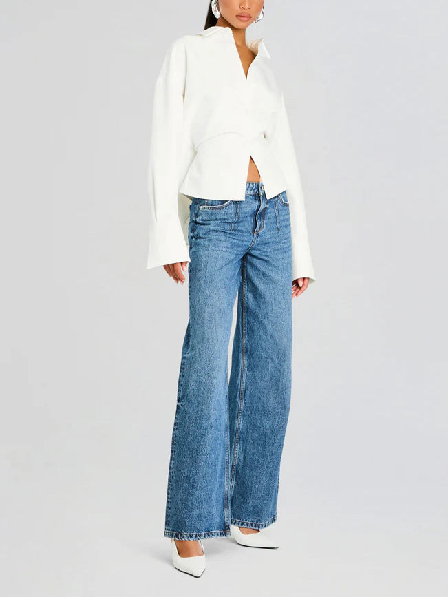 Elegant white draped button-down shirt for women. Versatile blouse, perfect for workwear, office, or casual chic style.