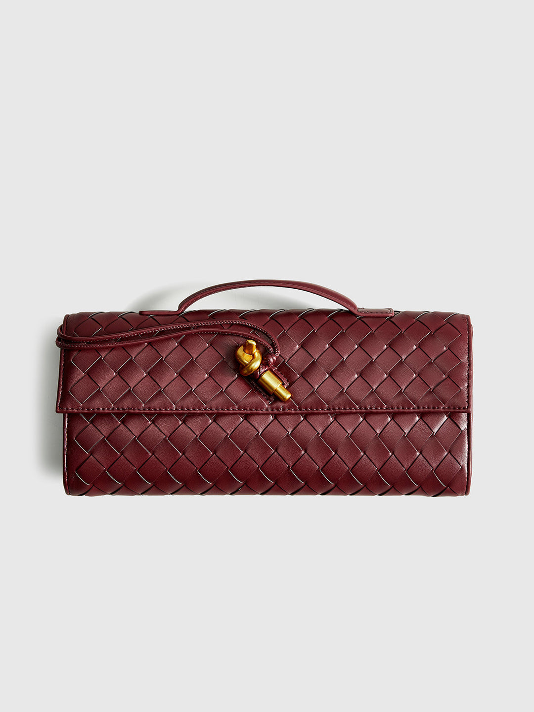 Stylish women's woven texture flap clutch, a chic accessory for evenings and parties.