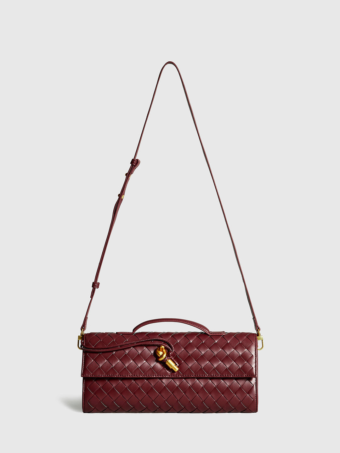 Elegant women's woven flap evening clutch, a versatile fashion accessory handbag.