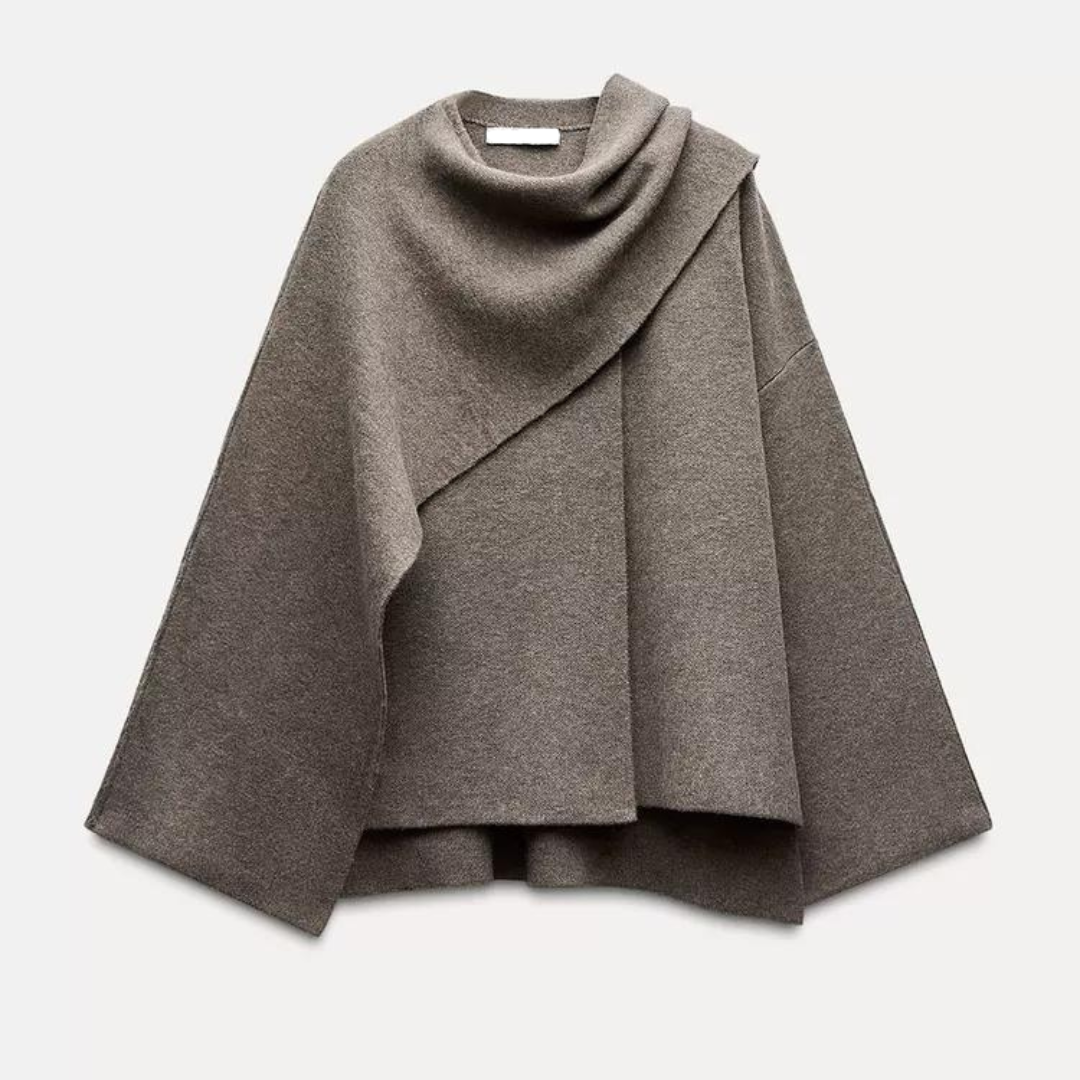 Warm women's Ella poncho, an elegant winter wrap perfect for stylish comfort and outerwear.