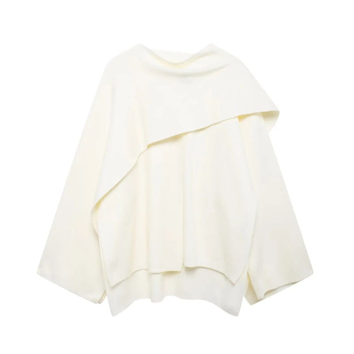 Cozy women's Ella winter poncho with an asymmetrical hem, great for elegant fall fashion.
