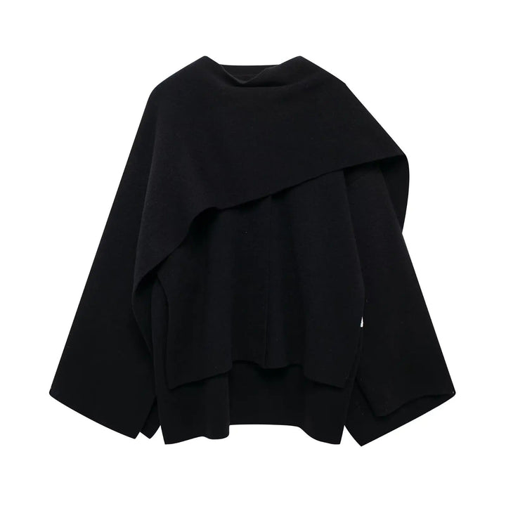 Ella women's poncho, a stylish and warm winter wrap, perfect for casual chic layering.