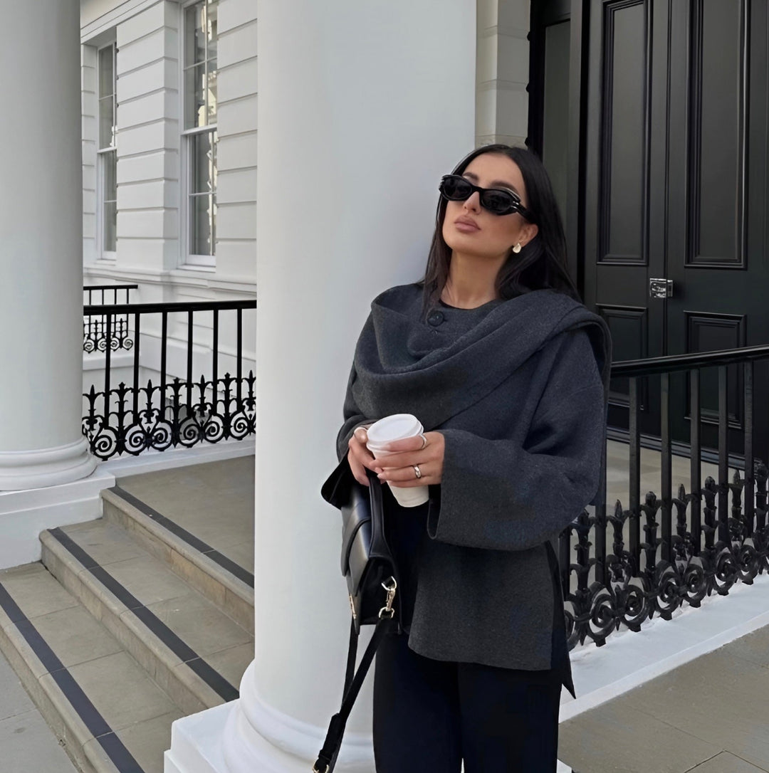 Stylish women's winter poncho, Ella, offering warm comfort and chic fall fashion outerwear.