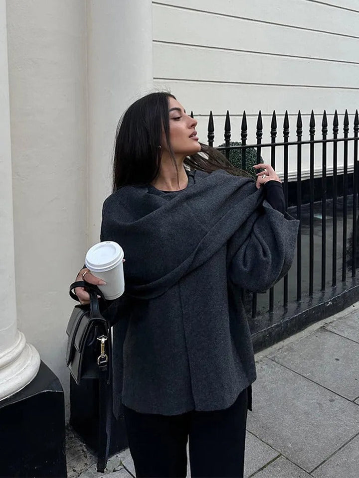Elegant women's winter poncho, Ella, a perfect layering piece for casual chic comfort and warmth.