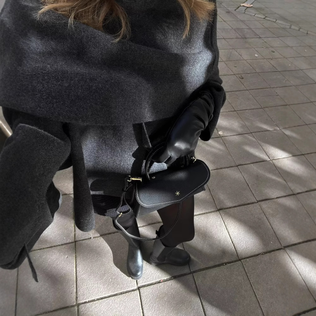 Asymmetrical women's Ella poncho, a stylish winter wrap and cozy outerwear for effortless fashion.