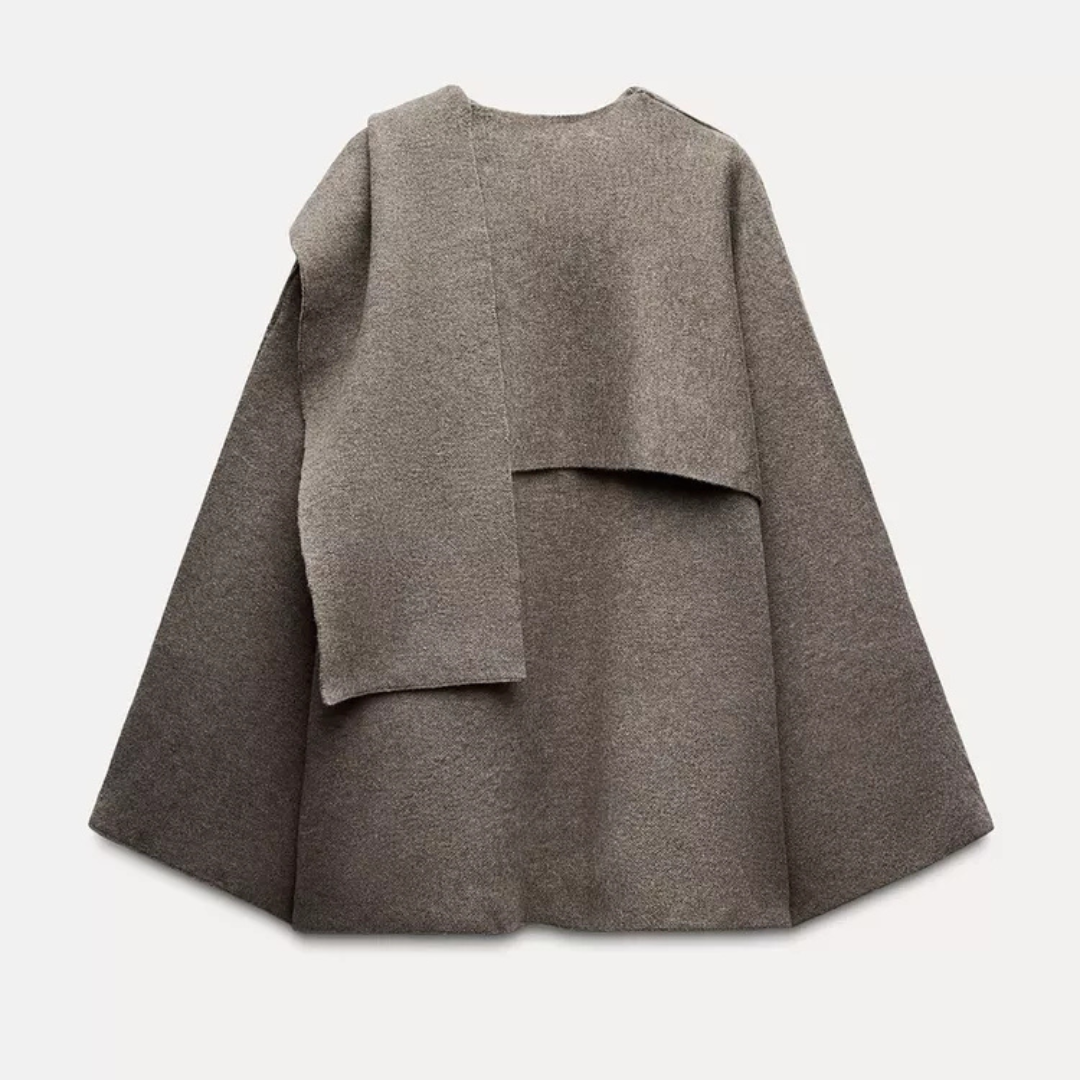 Chic women's Ella poncho, an oversized sweater alternative for stylish and cozy winter fashion.