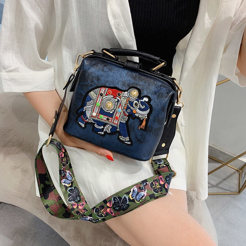 Colorful mandala shoulder bag for women. Embroidered, lightweight cotton blend fashion accessory.