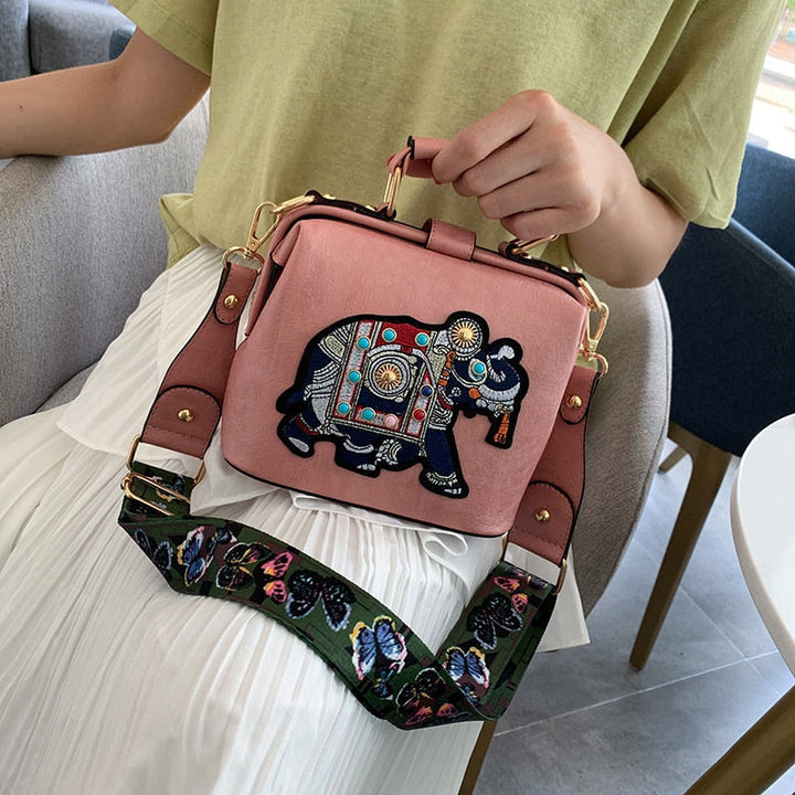 Versatile women's bohemian handbag with intricate mandala embroidery. Lightweight & stylish.