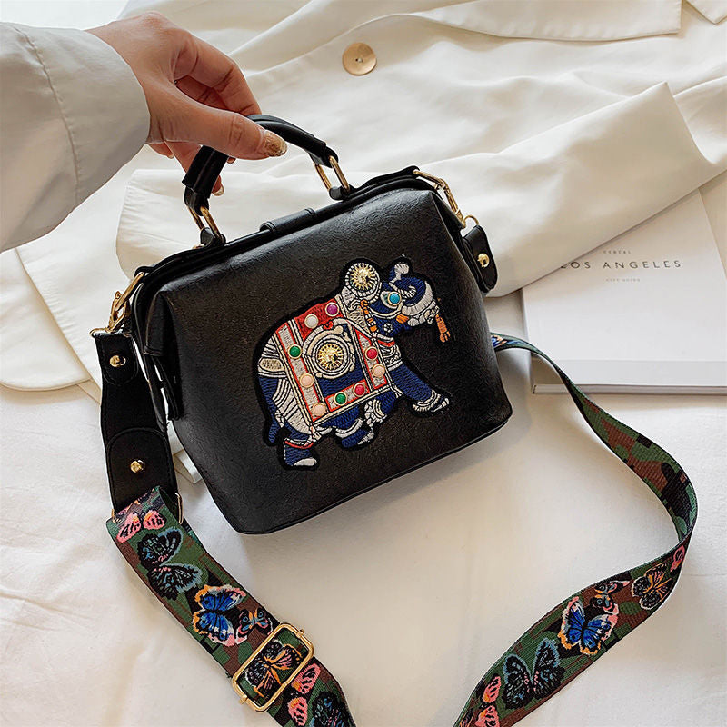 Boho chic women's handbag with beautiful embroidered mandala. Lightweight, multi-use accessory.